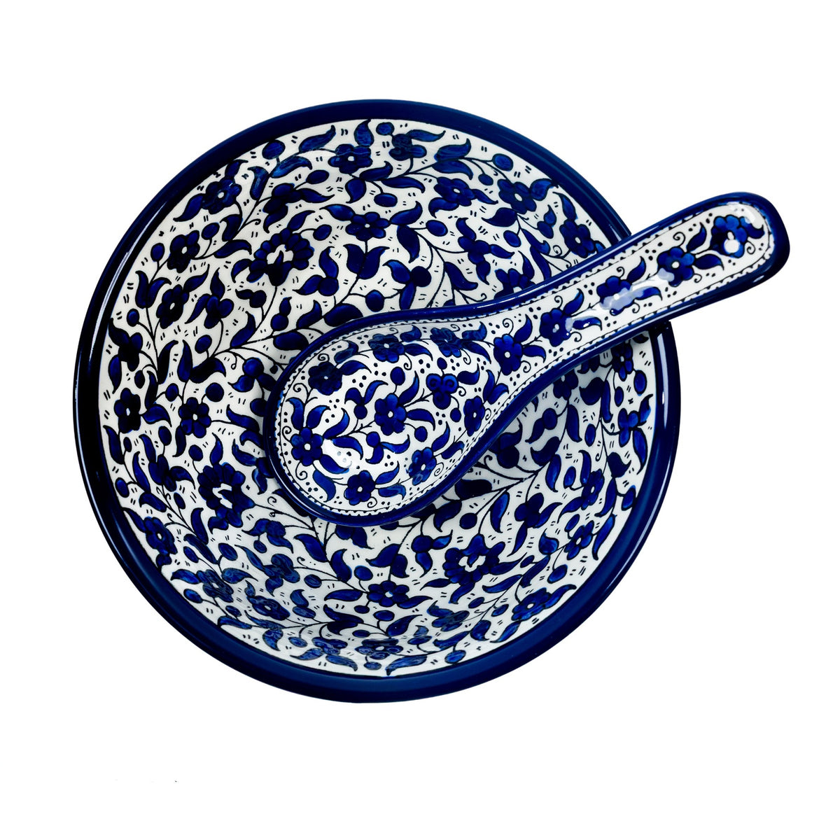 Round Ceramic Serving Bowl 9.84 Inch in Indigo, shown with a serving spoon