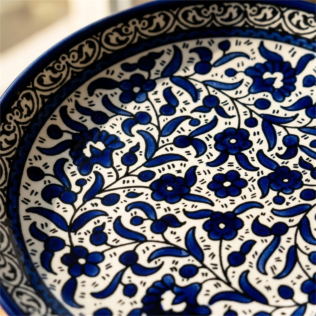 Round Ceramic Serving Dish 7.48 Inch in Indigo, close-up of the hand-painted detail