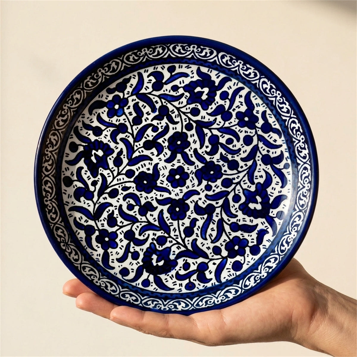 Round Ceramic Serving Dish 7.48 Inch in Indigo, held in hands to show scale