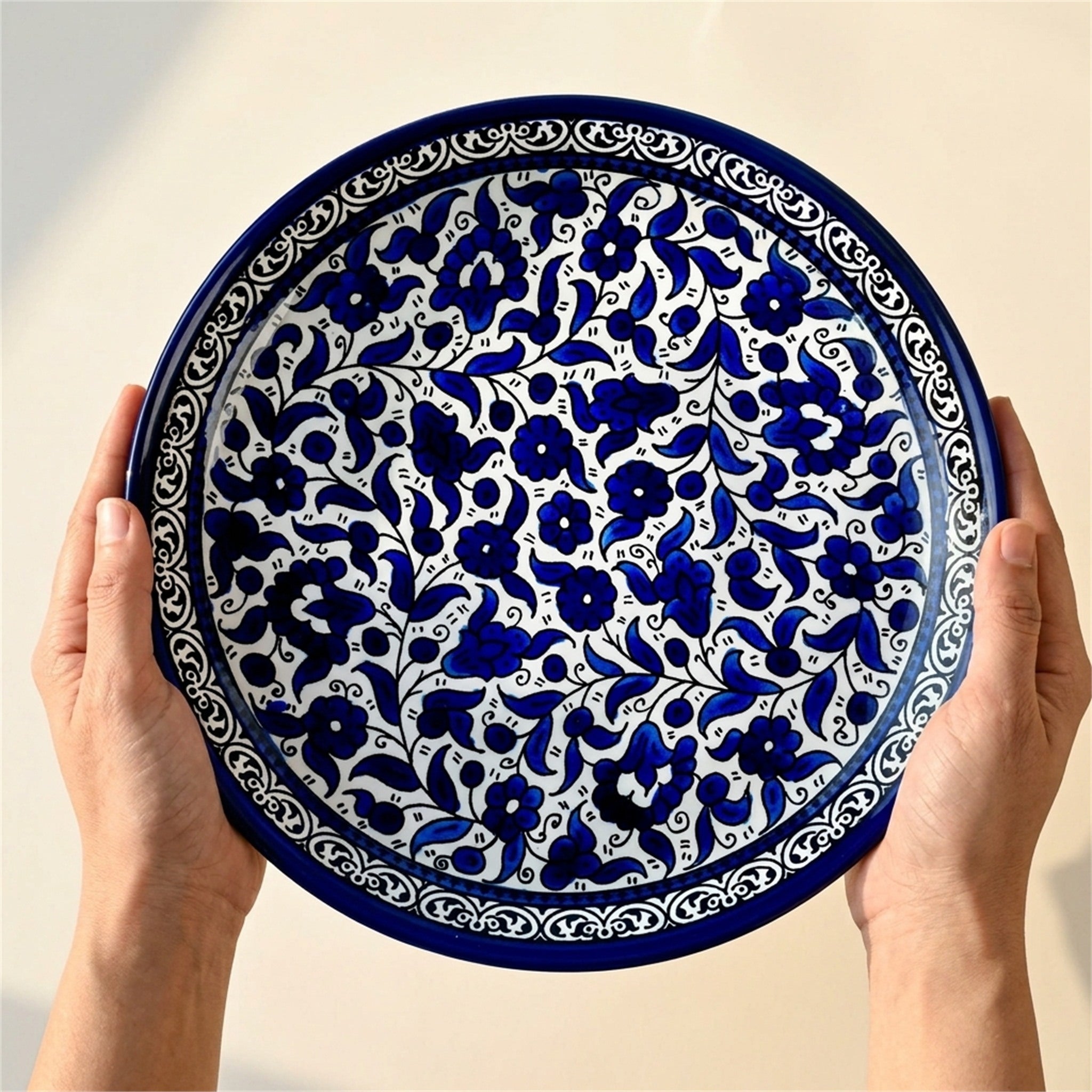 Round Ceramic Serving Dish 9.84 Inch in Indigo, held in hands to show scale