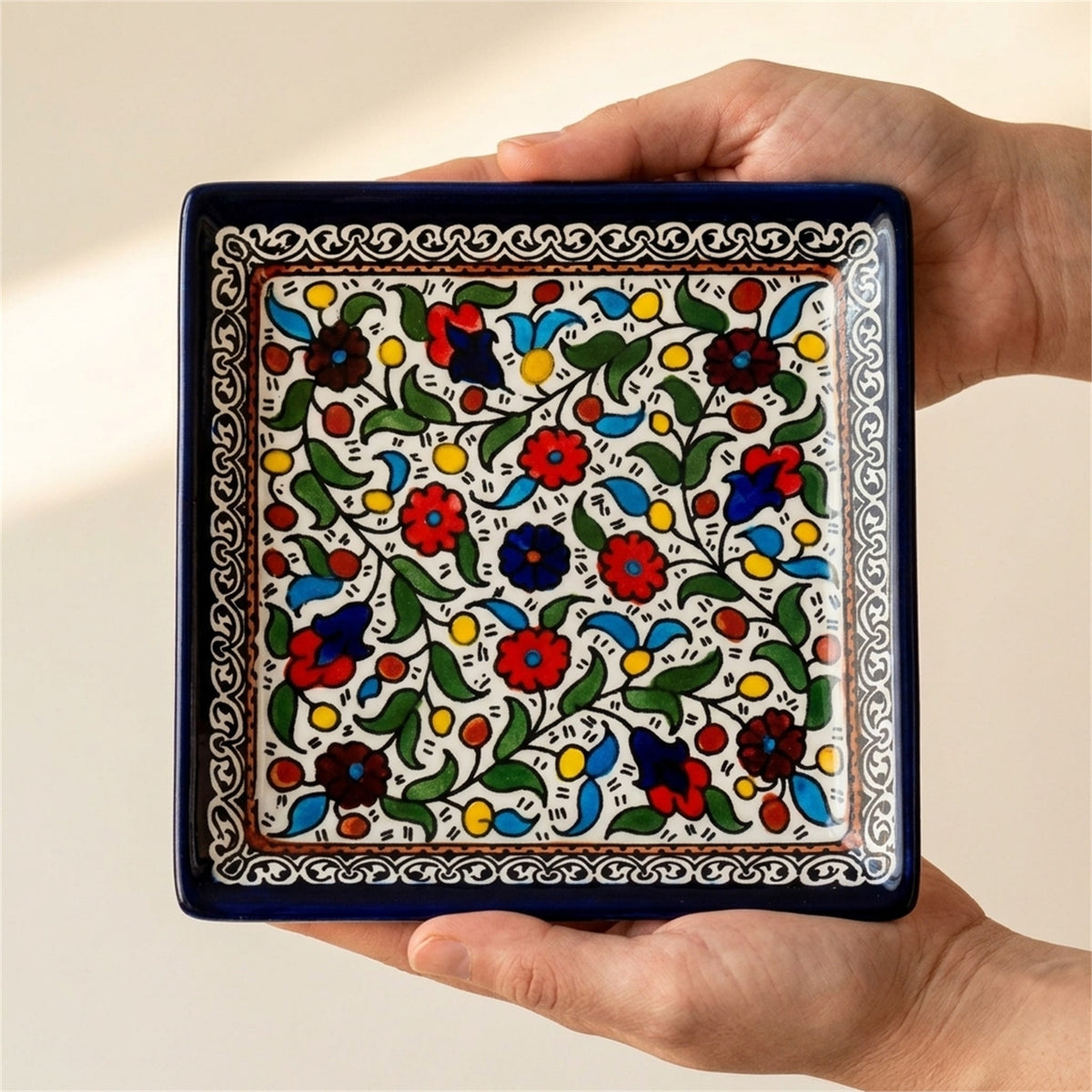Square Serving Platter 6.69 Inch in Floral, held in hands to show scale