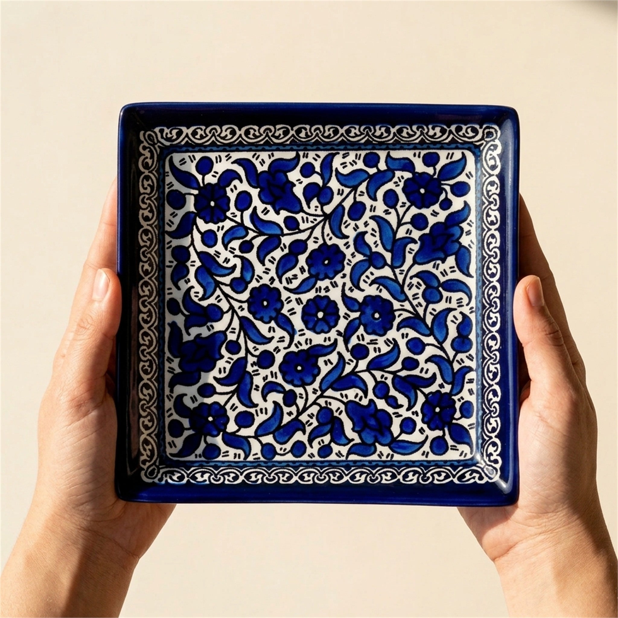Square Serving Platter 6.69 Inch in Indigo, held in hands to show scale