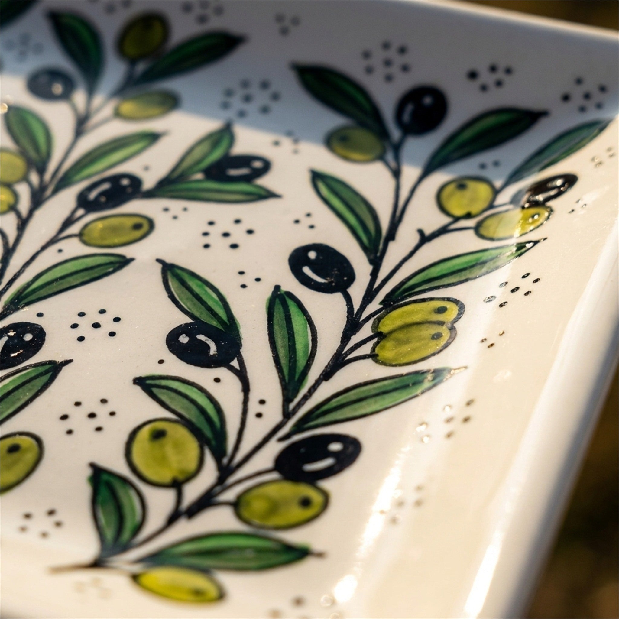 Square Serving Platter 6.69 Inch in Olive Green, close-up of the hand-painted detail