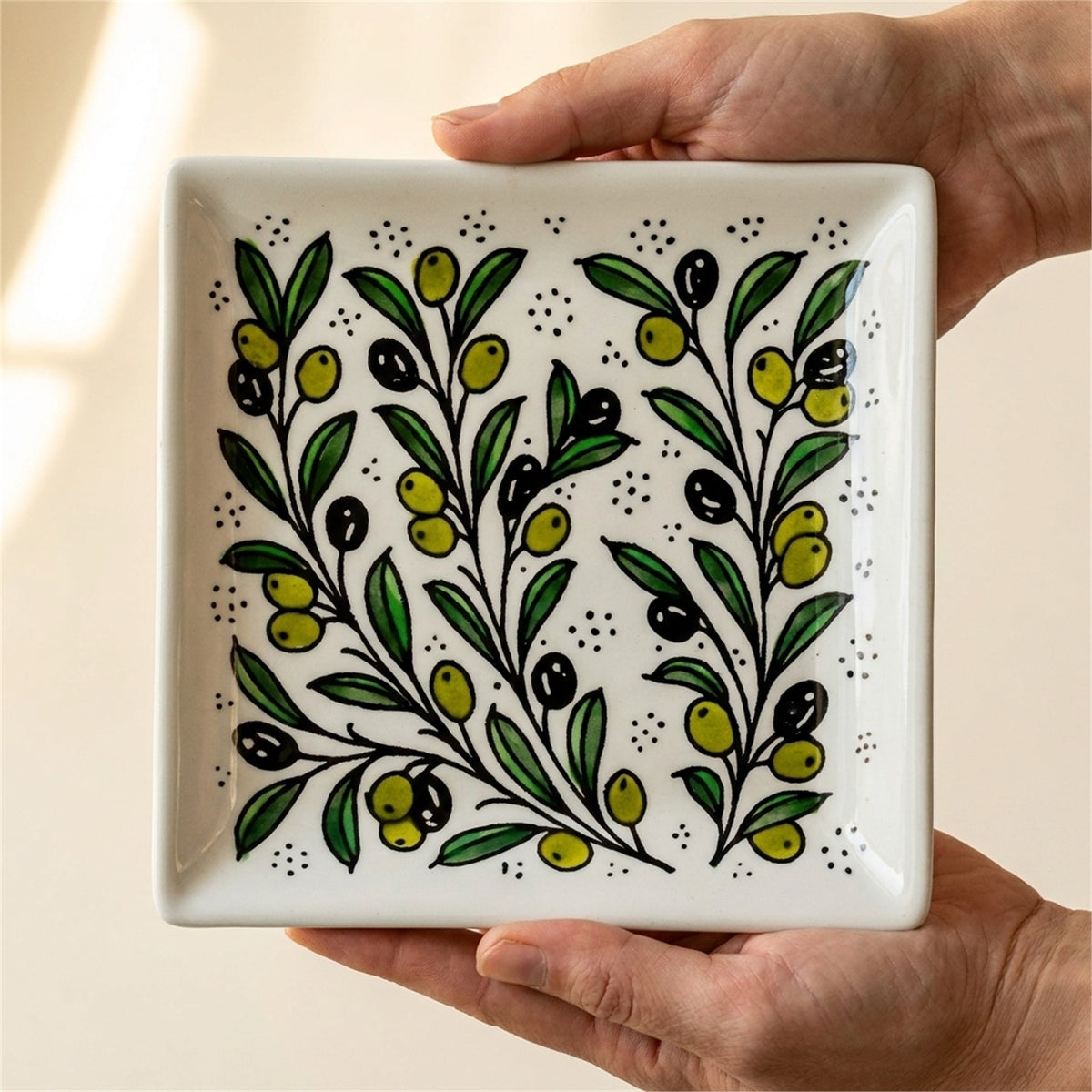 Square Serving Platter 6.69 Inch in Olive Green, held in hands to show scale